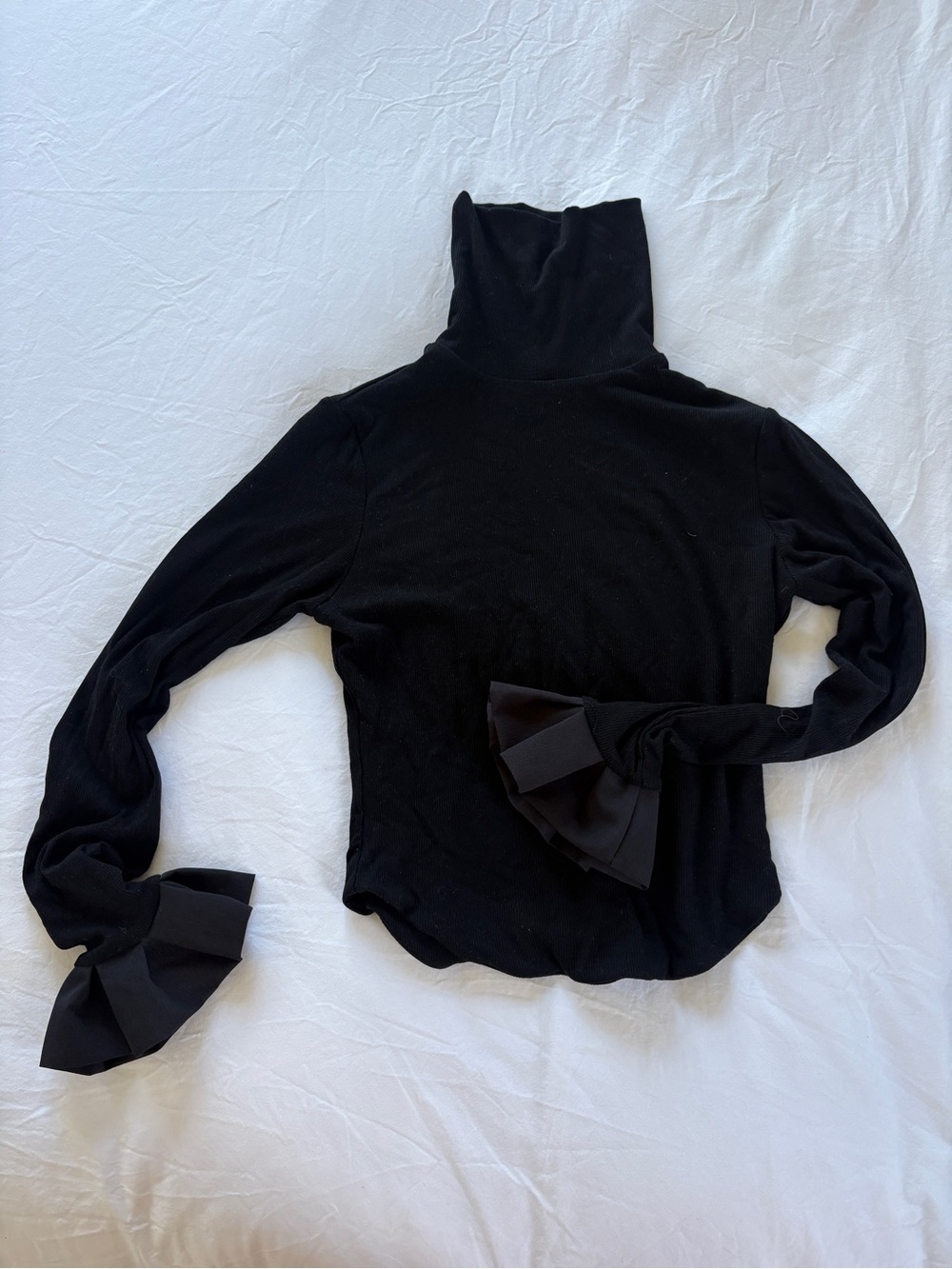 Black Turtleneck Sweater with Bow Cuff Details
